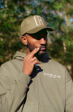 Load image into Gallery viewer, DR Monogram Trucker Hat Olive
